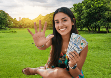 An AI generated woman with long brown hair holding up her hand to show all 5 fingers. Has money in her other hand.